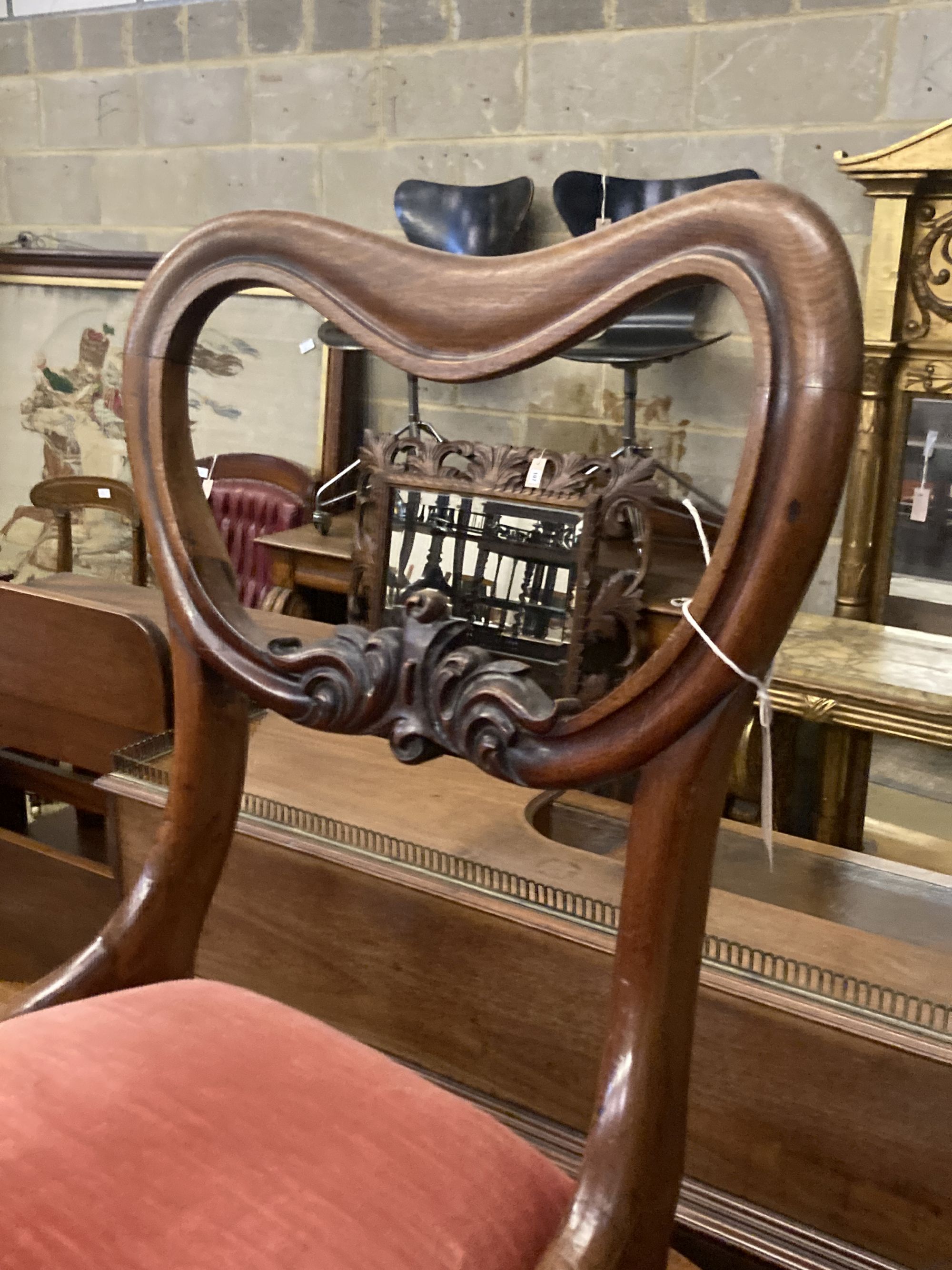 A set of four Victorian mahogany dining chairs